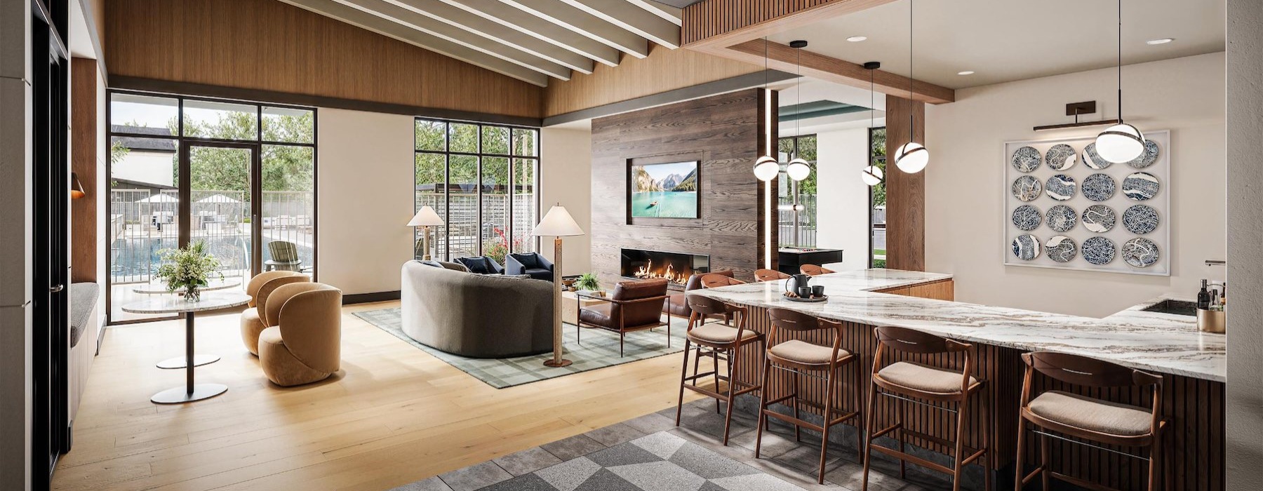 a large room with a large bar and chairs