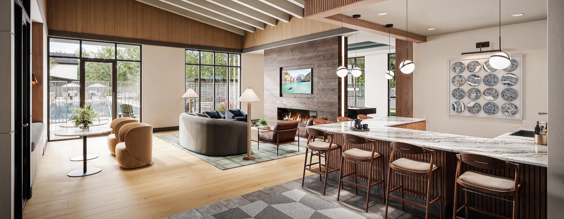 a large room with a large bar and chairs