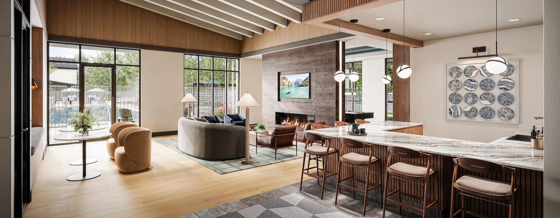 a large room with a large bar and chairs