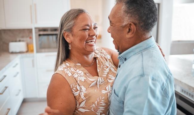 a man and a woman laughing